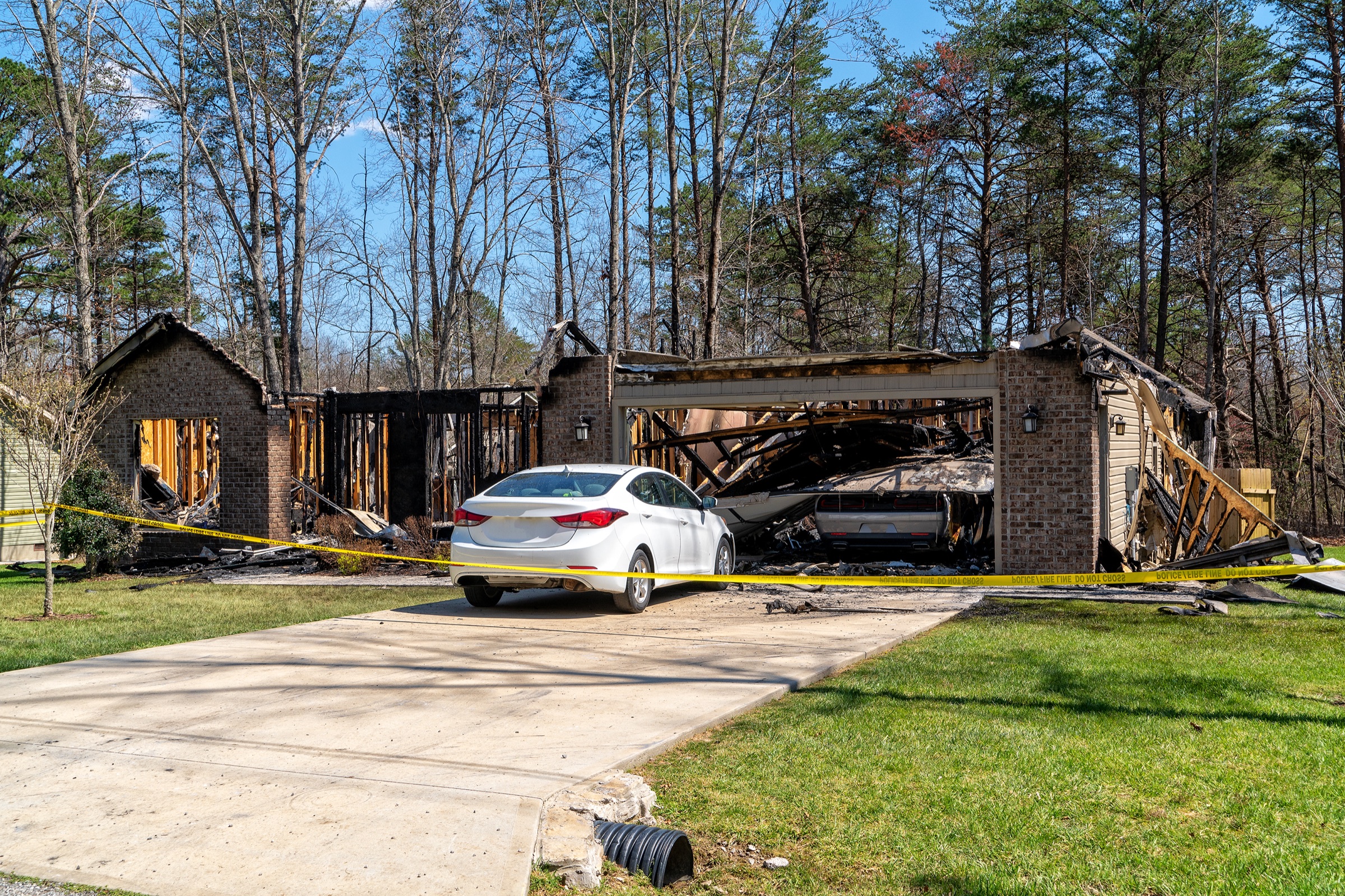 Fire-damaged residential property exterior after a loss